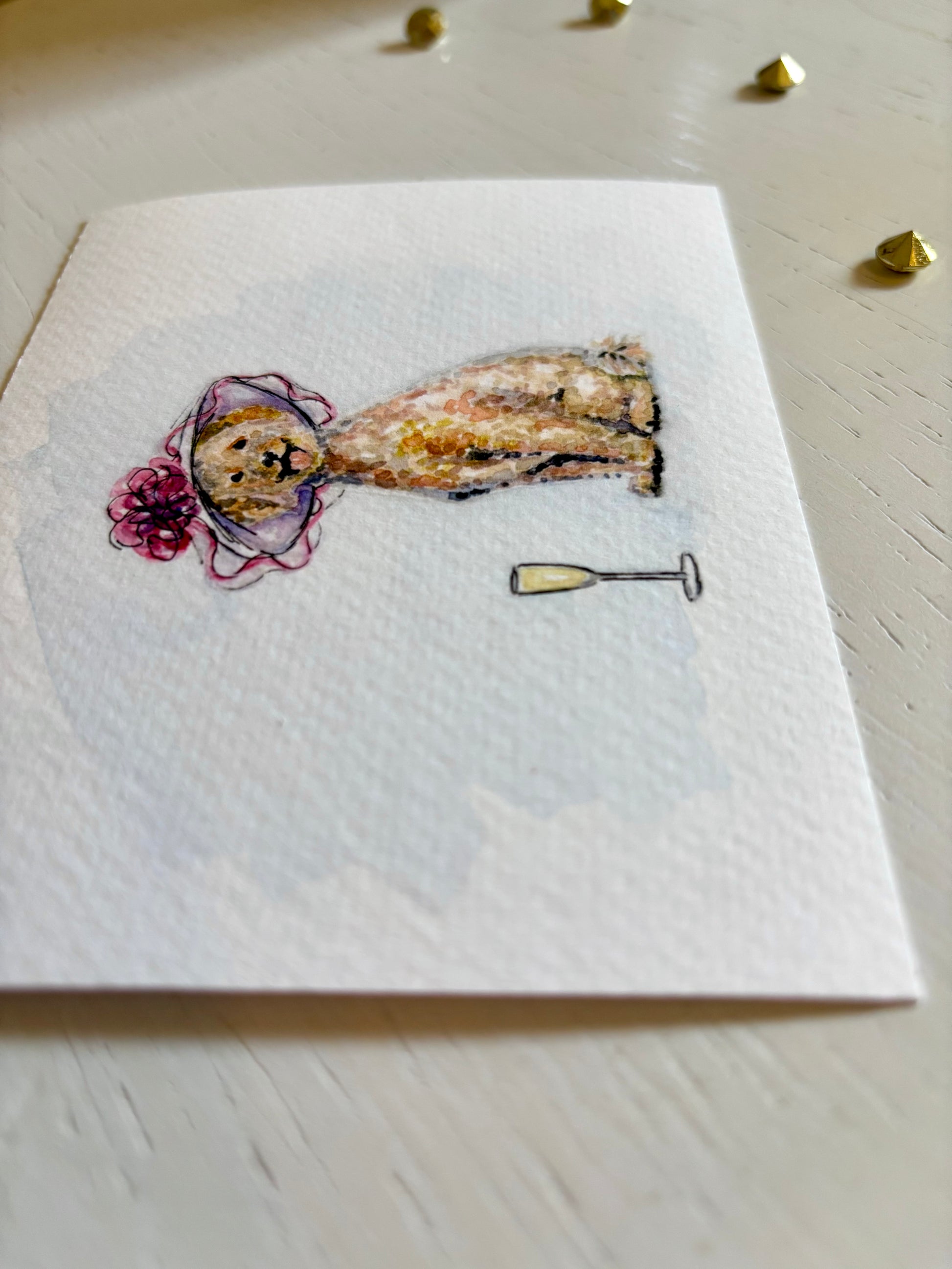 Fine art print with a decorative design of a Golden Doodle and a champagne glass on a light wooden surface.