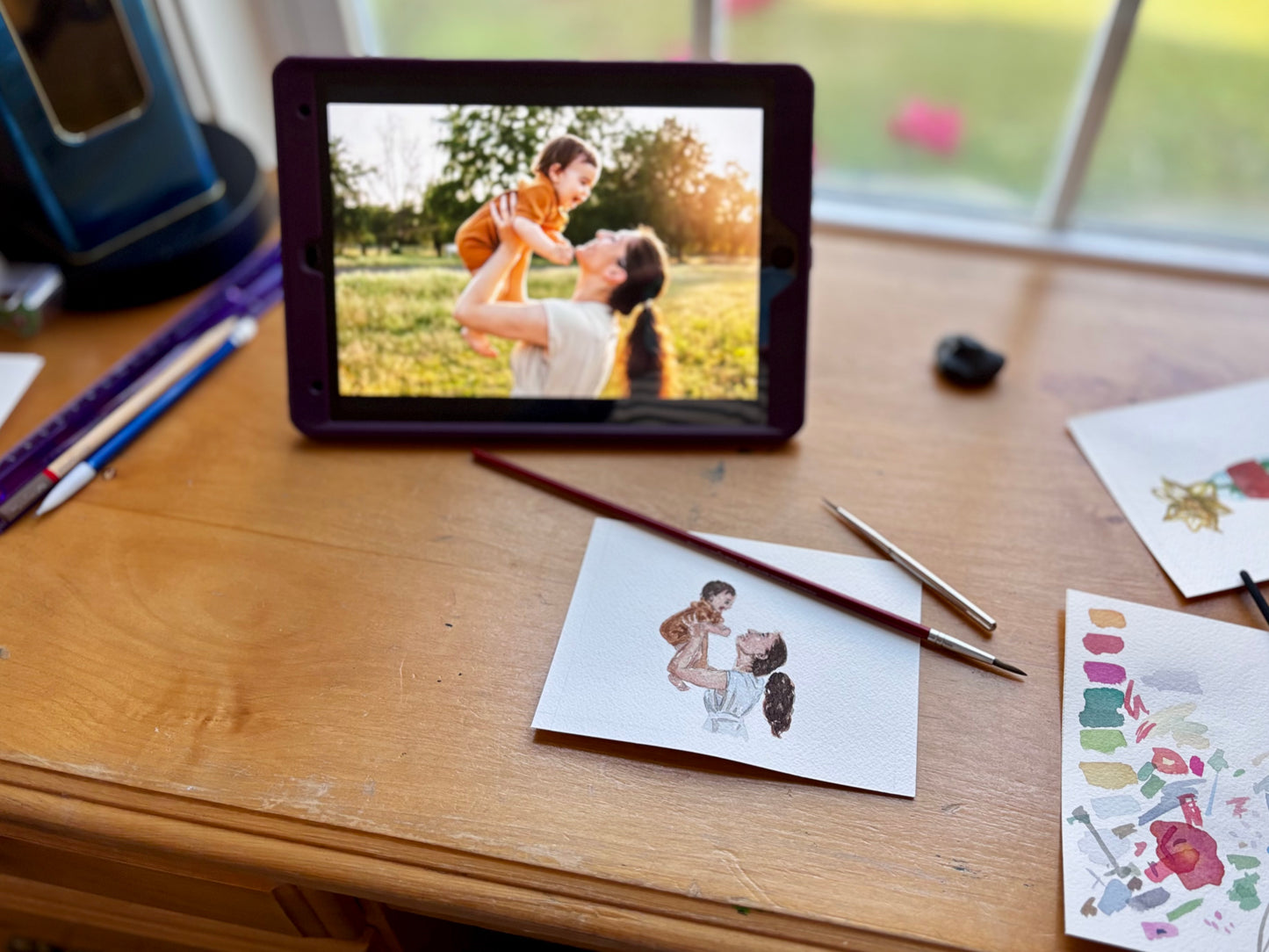 Artist's custom watercolor portrait aesthetic work setup. 